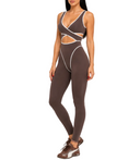 Model wearing the Chateau Chocolate & White luxury women's jumpsuit by AP Collection